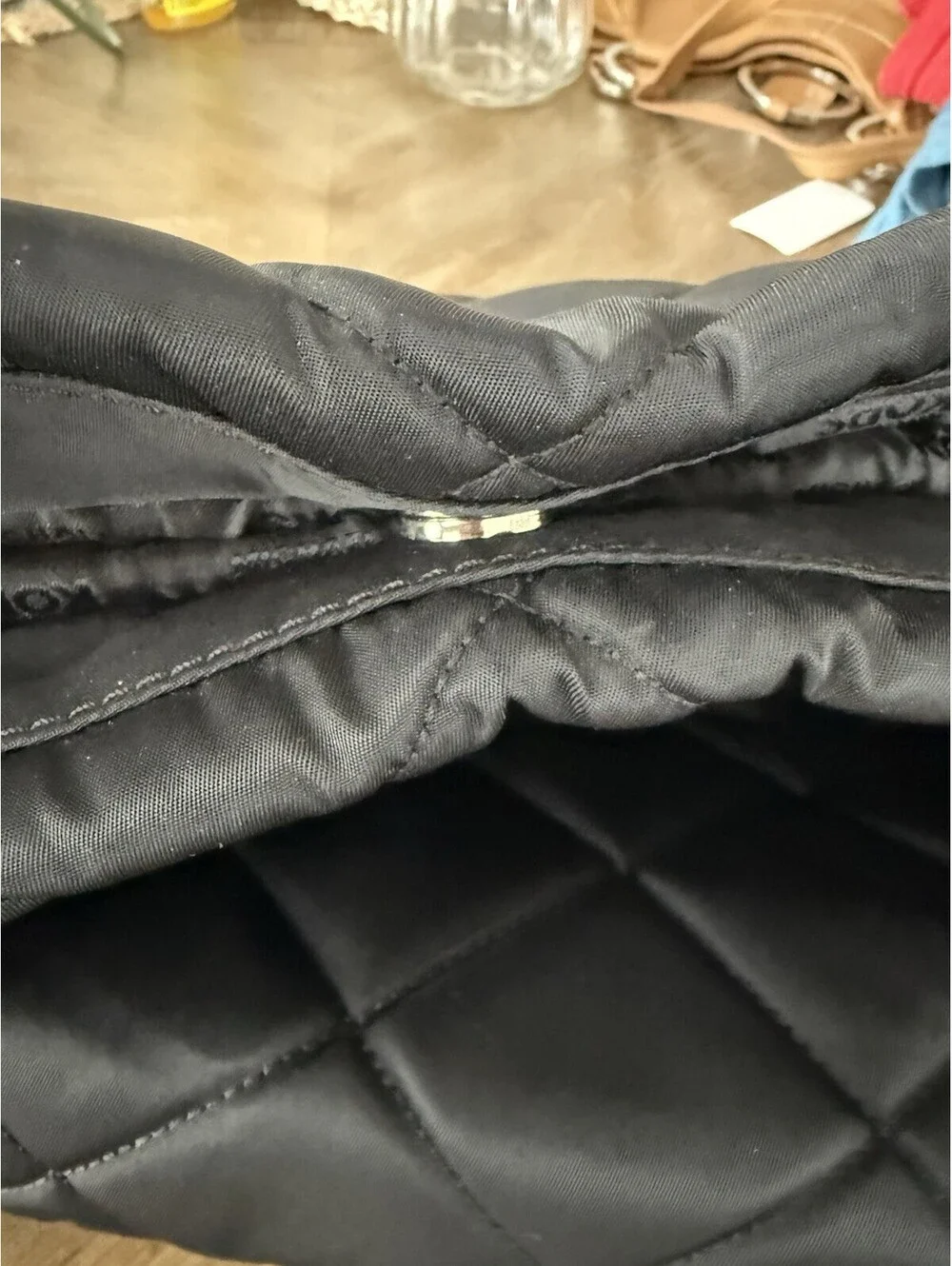 Michael Kors measures 15”